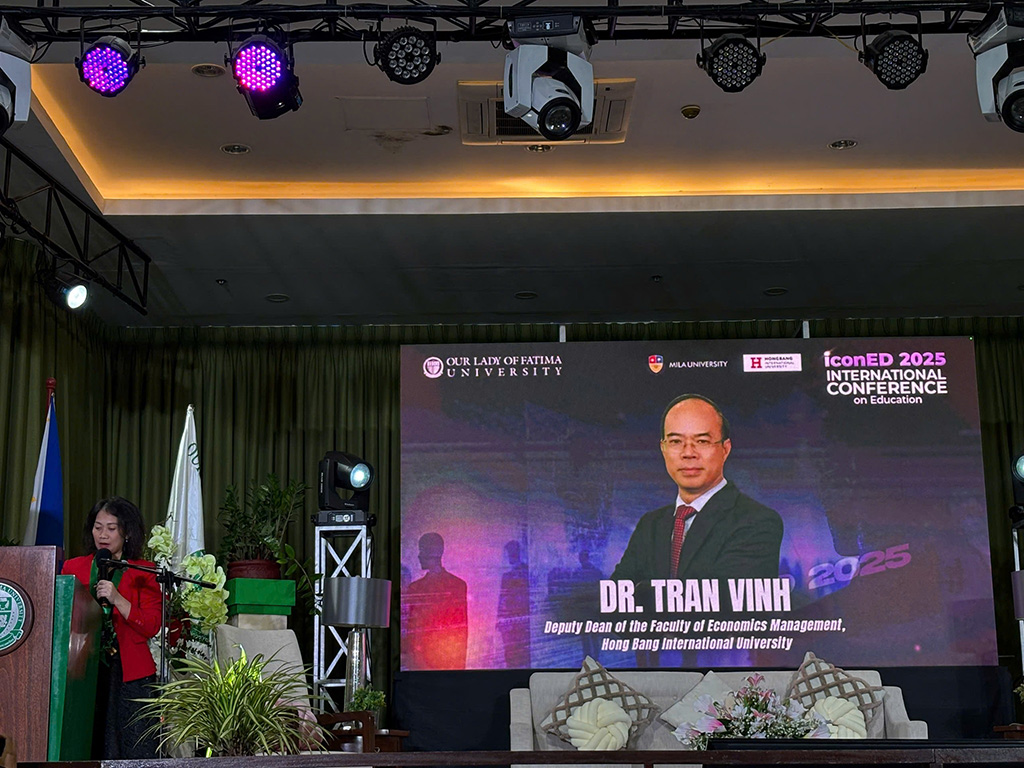 TS. Trần Vinh – Phó Trưởng khoa Kinh tế – Quản trị HIU trình bày tham luận tại Hội nghị iconED 2025